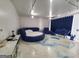 Bright living room area with unique epoxy flooring and custom furnishings at 620 Ne Peachtree Street # 901, Atlanta, GA 30308