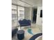 Sunlit living room area with unique epoxy flooring and custom furnishings at 620 Ne Peachtree Street # 901, Atlanta, GA 30308