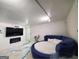Cozy living room area with unique epoxy flooring and custom furnishings at 620 Ne Peachtree Street # 901, Atlanta, GA 30308