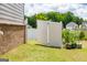 Fenced-in backyard featuring a well-maintained lawn and lush landscaping at 13568 Scenic Pkwy, Covington, GA 30014