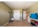 Versatile bonus room featuring neutral carpet and paint at 13568 Scenic Pkwy, Covington, GA 30014