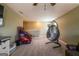 Game room featuring a hanging chair and basketball game at 13568 Scenic Pkwy, Covington, GA 30014