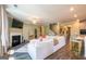 Spacious living room with fireplace, comfortable sofa, and open layout at 13568 Scenic Pkwy, Covington, GA 30014