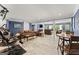 Finished basement featuring workout equipment, living area, and tile flooring at 1572 Azalea Dr, Lawrenceville, GA 30043