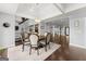 Dining room features hardwood floors, chandelier, and open concept floorplan at 1572 Azalea Dr, Lawrenceville, GA 30043