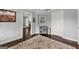 Entry hallway with hardwood floors and modern decor at 1572 Azalea Dr, Lawrenceville, GA 30043