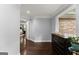 Hallway featuring hardwood floors, natural light, and neutral wall color at 1572 Azalea Dr, Lawrenceville, GA 30043