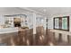 Spacious living room with hardwood floors, stone fireplace, and built-in bookshelves at 1572 Azalea Dr, Lawrenceville, GA 30043