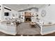 Cozy living room features stone fireplace, built-in bookshelves, and comfortable seating at 1572 Azalea Dr, Lawrenceville, GA 30043