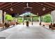 Large pavilion with an open-air design, featuring ample seating and views of the lush surroundings at 1572 Azalea Dr, Lawrenceville, GA 30043