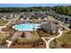Aerial view of community pool, playground, and surrounding homes at 4065 Holland Grove, Lawrenceville, GA 30044