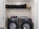 Laundry room featuring modern Samsung appliances, and storage shelves at 4065 Holland Grove, Lawrenceville, GA 30044