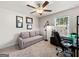 Office space with a gray couch, desk, and a window for natural light at 4065 Holland Grove, Lawrenceville, GA 30044