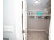 A walk-in closet with ample storage space and shelving is ideal for organization at 909 Ne Otter Way Ne Way, Marietta, GA 30068