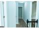 Hallway with wood-look flooring providing access to bedrooms and other living areas at 909 Ne Otter Way Ne Way, Marietta, GA 30068