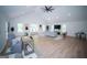 Open living room boasting vaulted ceilings, a ceiling fan, and a large window to let in natural light at 909 Ne Otter Way Ne Way, Marietta, GA 30068