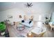 Open-concept living room with high ceilings, a contemporary design, and plenty of space for relaxing and entertaining at 909 Ne Otter Way Ne Way, Marietta, GA 30068