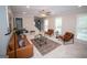 Bright and airy living room featuring neutral tones, stylish decor, and ample natural light at 909 Ne Otter Way Ne Way, Marietta, GA 30068