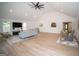 Expansive living area with vaulted ceilings, wood floors, and an open layout, ideal for modern living and entertaining at 909 Ne Otter Way Ne Way, Marietta, GA 30068