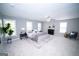 A sprawling main bedroom offers a retreat-like feel with plush carpeting and ample space at 909 Ne Otter Way Ne Way, Marietta, GA 30068
