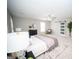 This spacious main bedroom features neutral tones, a ceiling fan, and a walk-in closet at 909 Ne Otter Way Ne Way, Marietta, GA 30068