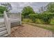 Landscaped backyard with a wooden deck or porch and greenery at 1555 New Ne St, Atlanta, GA 30307