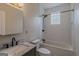 Modern bathroom with sleek fixtures and a tiled shower at 1555 New Ne St, Atlanta, GA 30307