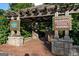 Edgewood Community Learning Garden entrance featuring brick pathway and wooden pergola at 1555 New Ne St, Atlanta, GA 30307