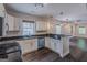 Bright kitchen features modern appliances, granite counters, neutral cabinets, and an open layout at 1555 New Ne St, Atlanta, GA 30307