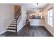 Open-concept living room with hardwood floors and lots of natural light at 1555 New Ne St, Atlanta, GA 30307