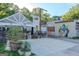 Restaurant exterior with covered seating, and artistic murals to attract visitors at 1555 New Ne St, Atlanta, GA 30307