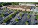 Aerial view of a Lowe's shopping center, showing the parking lot, storefront, and surrounding trees at 1555 New Ne St, Atlanta, GA 30307