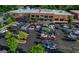 Busy shopping center featuring Kroger, Starbucks, and ample parking for convenient access to local stores at 1555 New Ne St, Atlanta, GA 30307