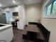 Cozy breakfast nook with built-in seating and a view of the kitchen's modern finishes and natural light at 2148 M L King Jr Sw Dr, Atlanta, GA 30310