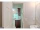 Hall bathroom featuring a doorway to the kitchen at 513 Shadow Valley Ct, Lithonia, GA 30058