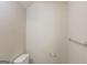Powder room with toilet and towel bar at 513 Shadow Valley Ct, Lithonia, GA 30058