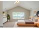 Spacious bedroom with neutral tones, a large window and comfortable furnishings for a restful and peaceful retreat at 513 Shadow Valley Ct, Lithonia, GA 30058