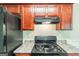 Kitchen featuring stainless steel appliances and ample cabinet space at 513 Shadow Valley Ct, Lithonia, GA 30058