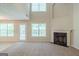 Spacious living room with a fireplace and an open layout, offering a comfortable area for relaxation and gatherings at 513 Shadow Valley Ct, Lithonia, GA 30058
