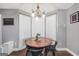 Breakfast nook featuring a round table, gray walls and a bay window at 950 Besse Way, Locust Grove, GA 30248