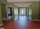 Open-concept foyer with hardwood floors at 950 Besse Way, Locust Grove, GA 30248
