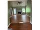 Spacious living room with a fireplace, vaulted ceilings, and hardwood flooring at 950 Besse Way, Locust Grove, GA 30248