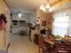 Functional kitchen area with white cabinetry, tile backsplash, and vintage appliances, ready for your personal touch at 1253 Gatewood Drive Dr, Lawrenceville, GA 30043