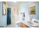 Full bathroom with tub, shower, and single sink vanity at 1587 Cronic Town Rd, Auburn, GA 30011