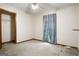 Empty bedroom with a closet and a window at 1587 Cronic Town Rd, Auburn, GA 30011