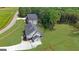 Aerial view of the property showing the home's layout, landscaping, and surrounding neighborhood at 3893 Indian Shoals Road, Dacula, GA 30019