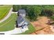 Aerial view of the property showing the home's layout, landscaping, and surrounding neighborhood at 3893 Indian Shoals Road, Dacula, GA 30019