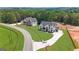 Aerial view of the community featuring well-maintained homes and lush landscaping at 3893 Indian Shoals Road, Dacula, GA 30019