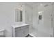 Bathroom features a glass shower, a vanity and modern fixtures at 3893 Indian Shoals Road, Dacula, GA 30019