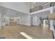 Open-concept living space with high ceilings, hardwood floors, and modern finishes at 3893 Indian Shoals Road, Dacula, GA 30019